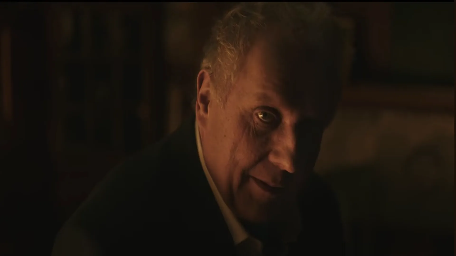 Sinister man in suit, lit by fire. Layers of Fear 3?