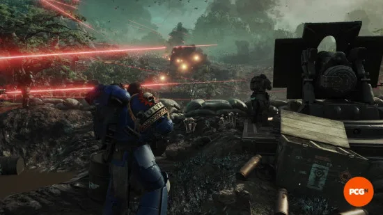 Space Marine 2 missions: Titus standing next to sandbags and a cannon as a Tyranid swarm approaches down the hill ahead, with laser fire across the battlefield.