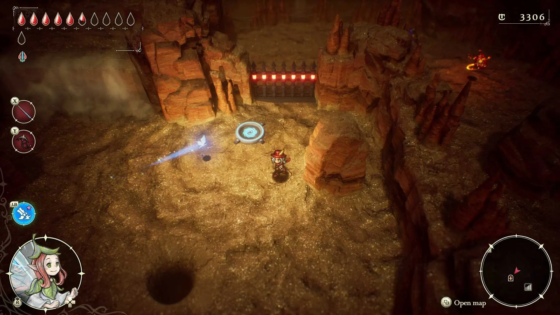 Elliot by the blue circle near the gate in the Desert Caves.