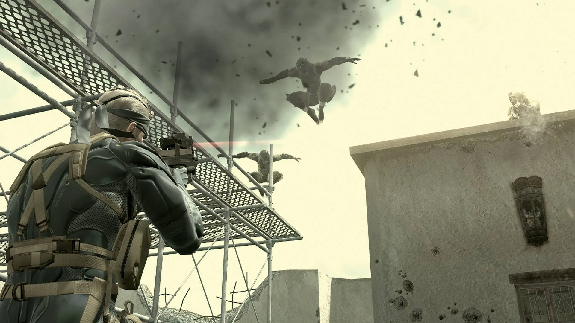 Solid Snake shoots a gun in Metal Gear Solid 4: Guns of the Patriots.