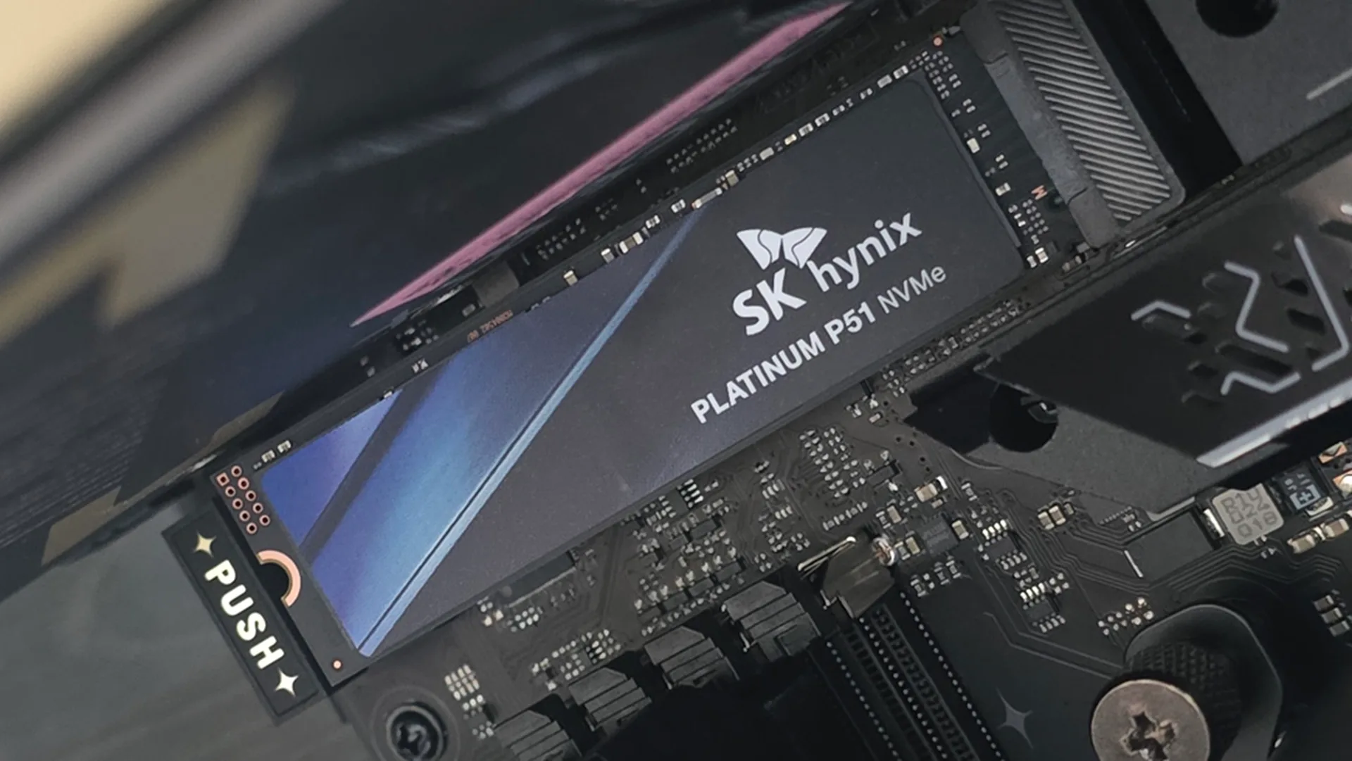An SK Hynix Platinum P51 drive installed inside a gaming PC.