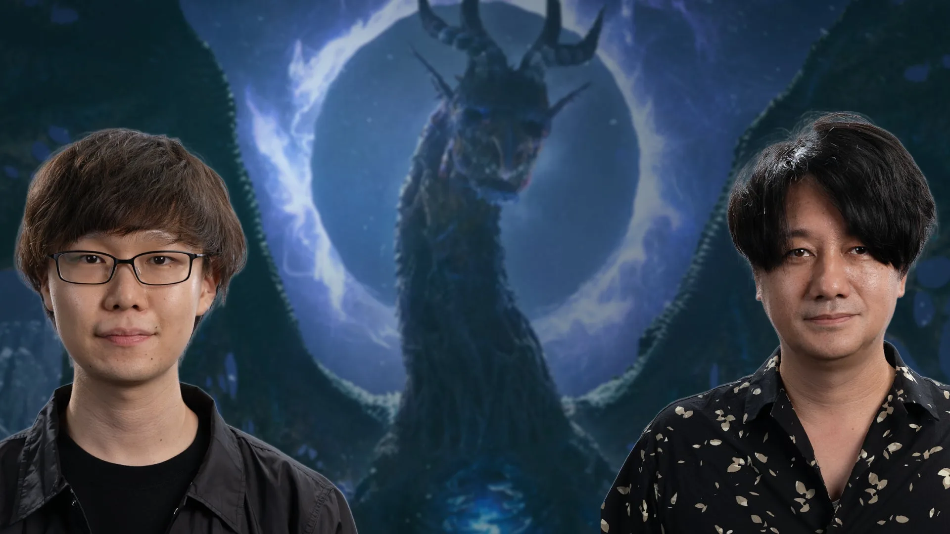 Two Japanese men in portrait (producer Naoto Oyama and director Kenta Kinoshita) in front of a dragon with outstretched wings.