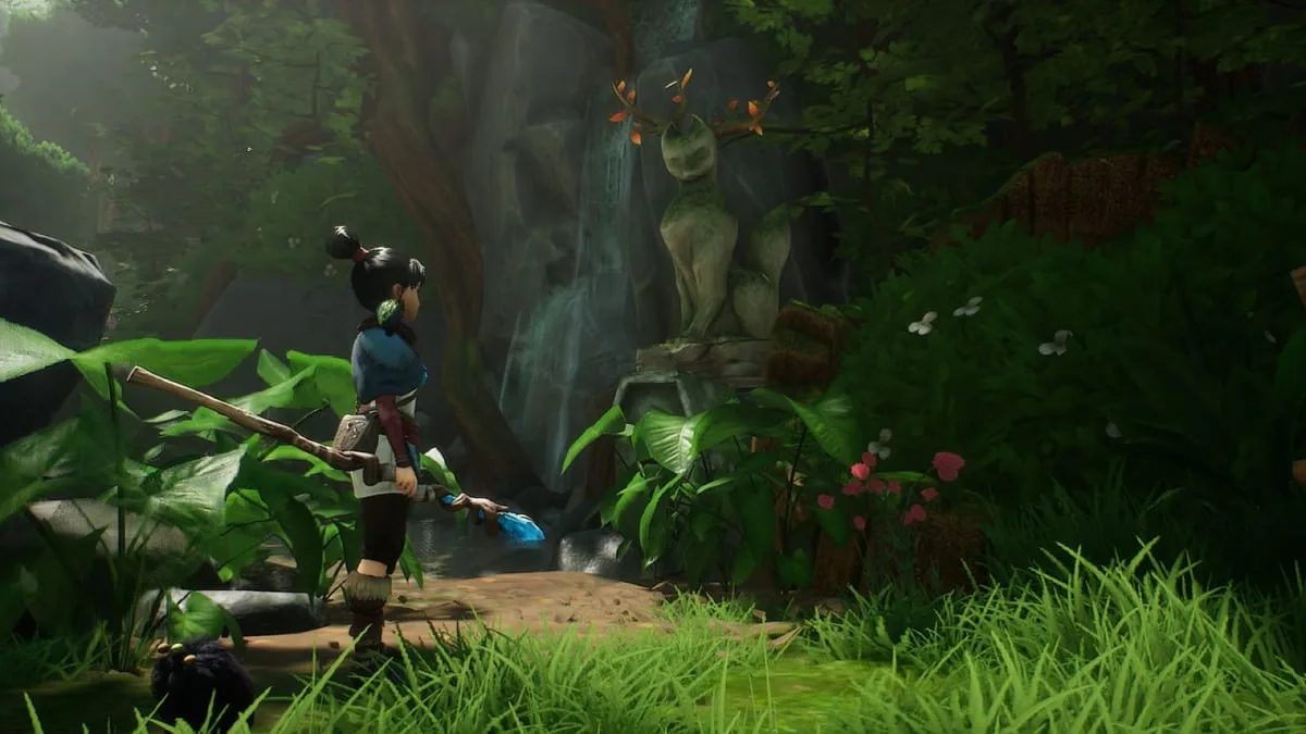 Kena in a vibrant environment from Kena: Bridge of Spirits.