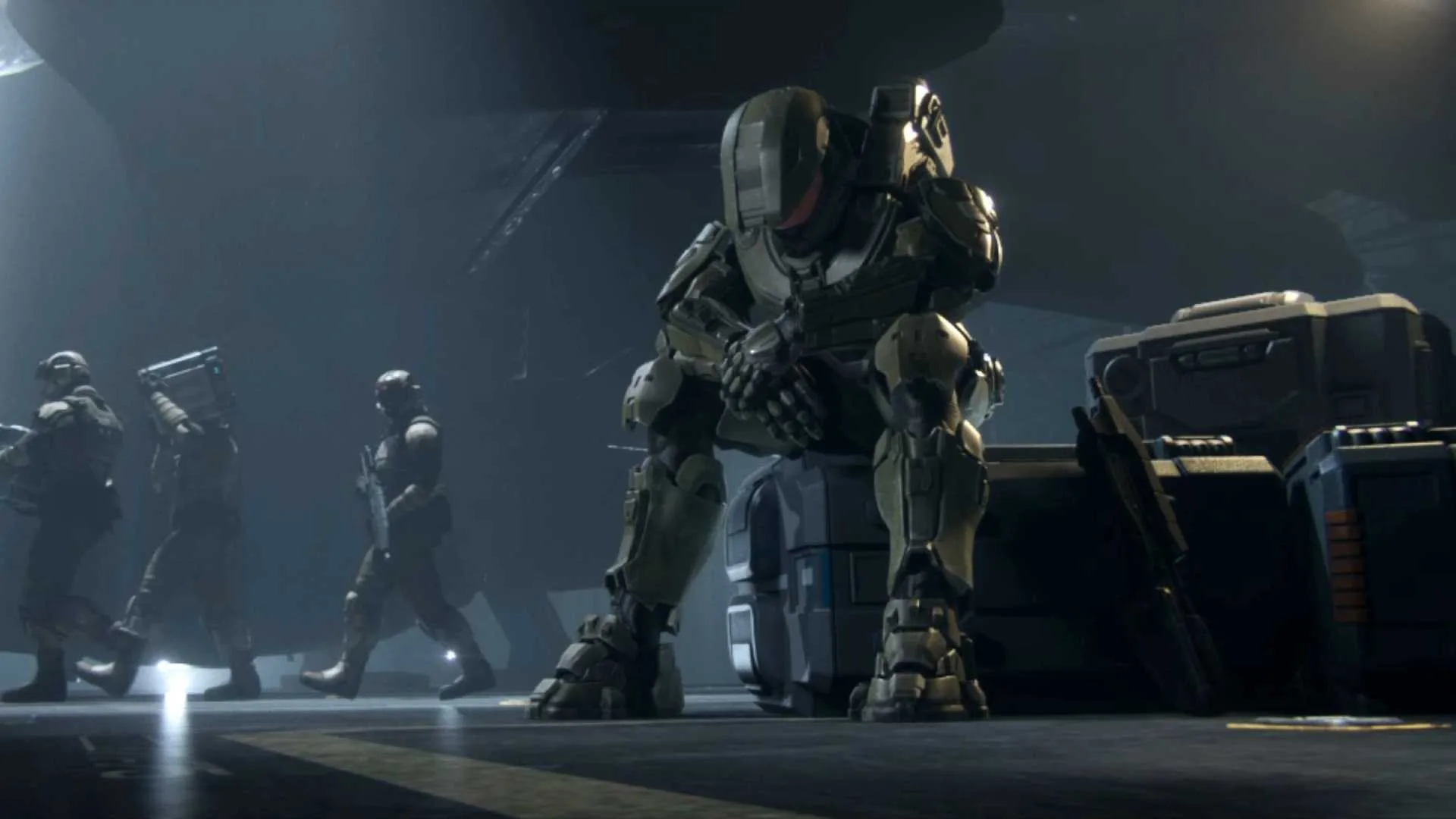 Master Chief sitting alone, hanging his head.