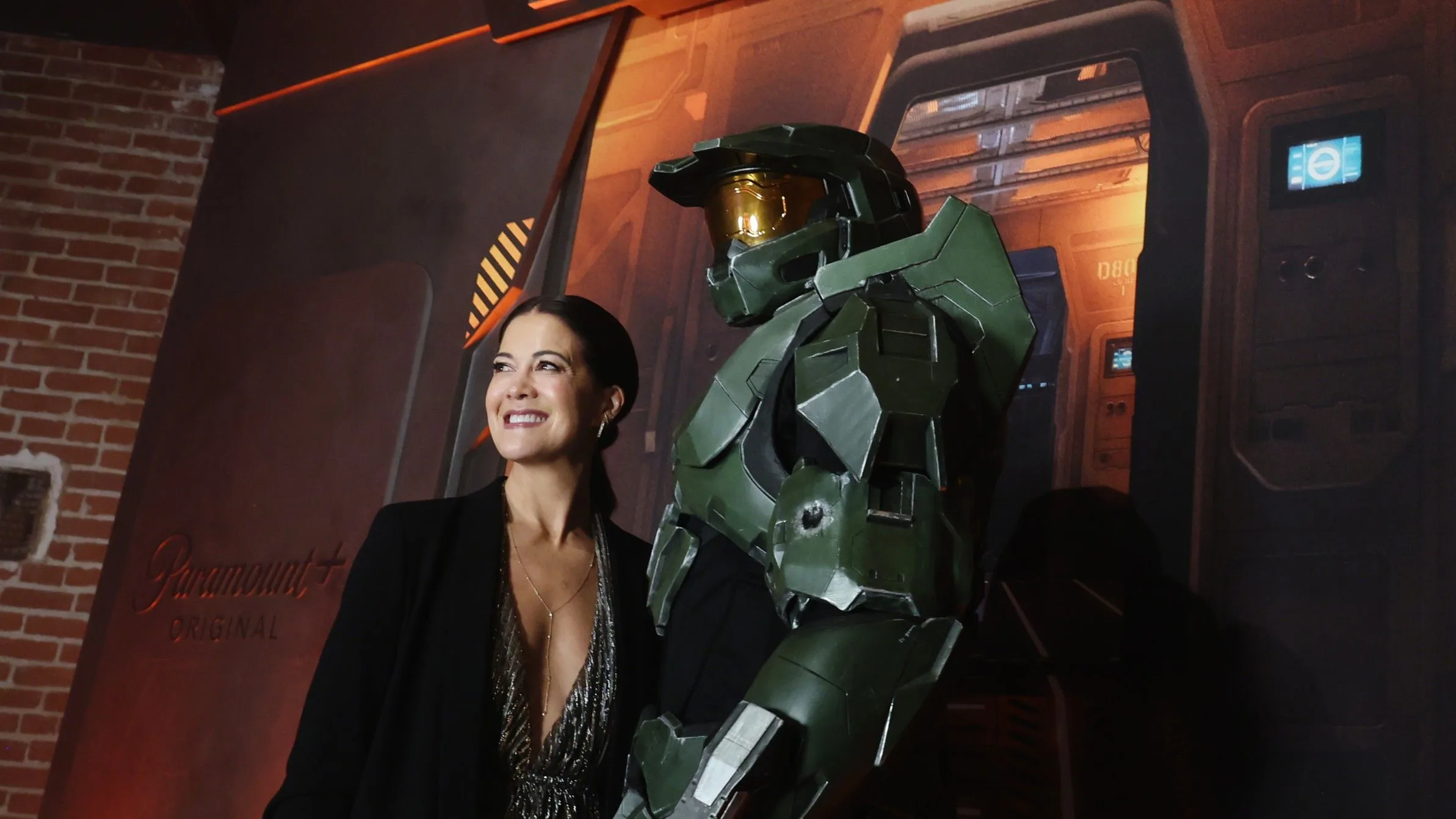 Kiki Wolfkill with Master Chief, representing her work on the Halo franchise and its TV adaptation.