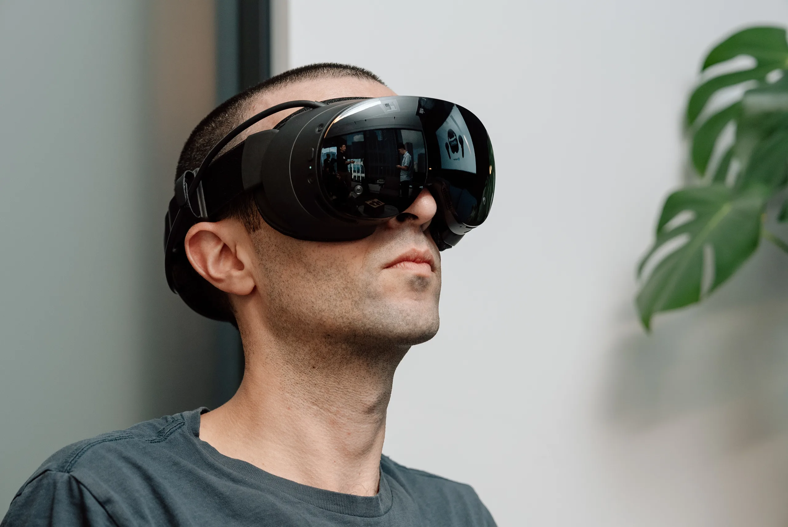 The Verge’s Jay Peters wearing Valve’s Steam Frame VR headset.