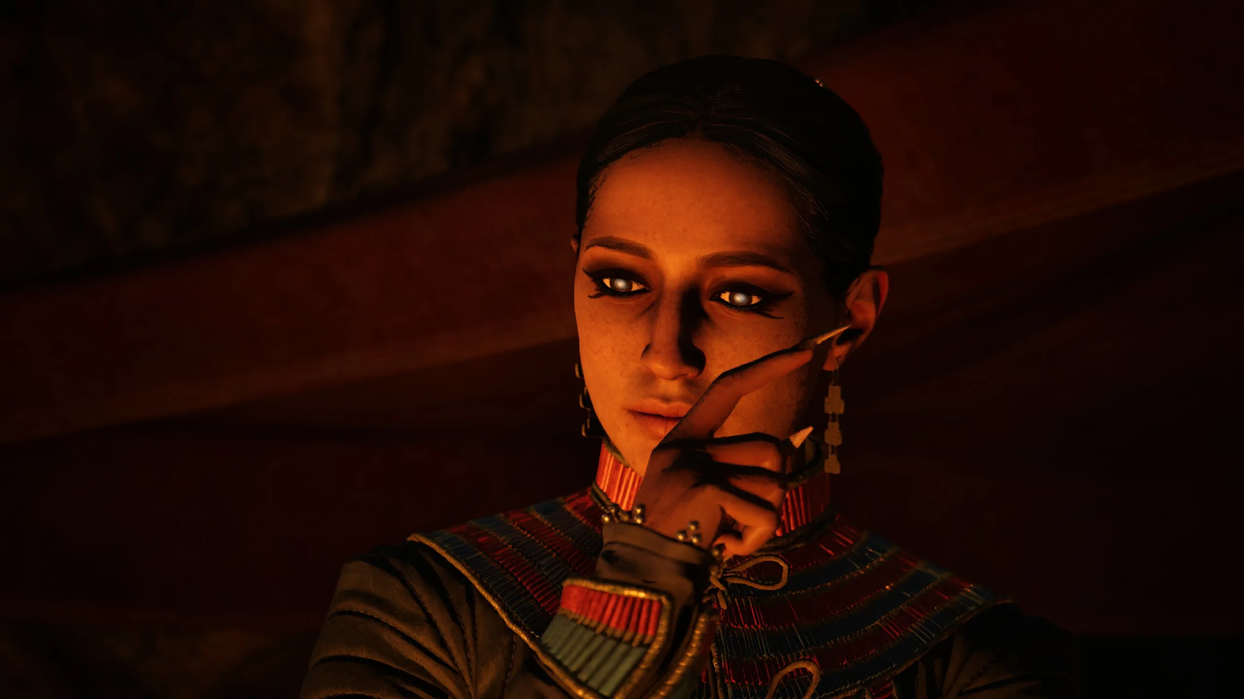 A woman holds a finger upright