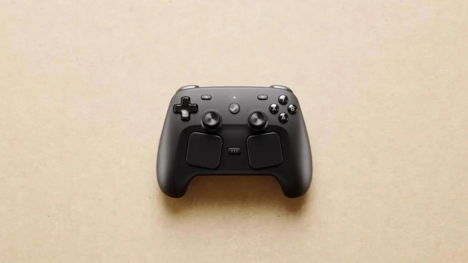 Steam Controller on beige background.