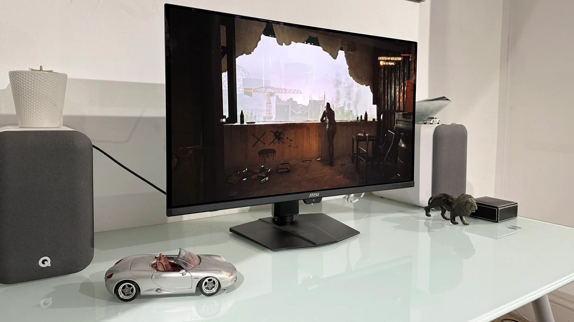 MSI MPG 322UR X24 monitor displaying a video game.
