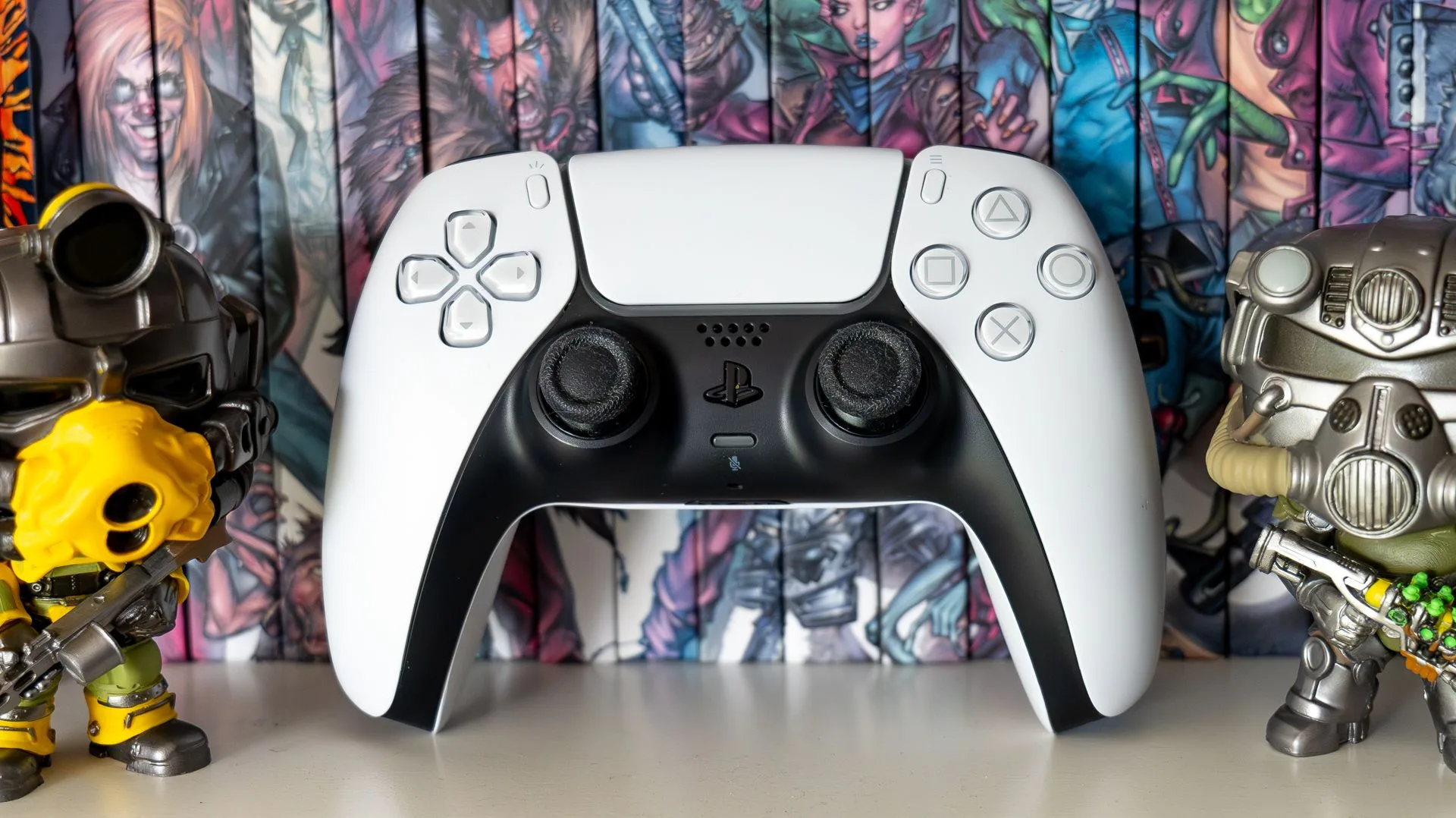 White DualSense controller with comic book background.