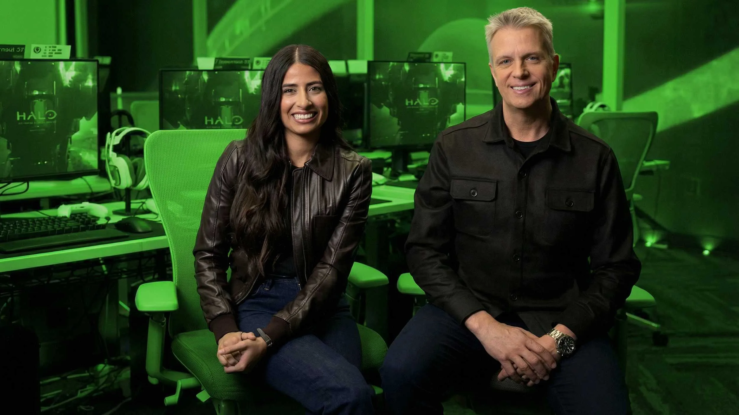Asha Sharma, Xbox CEO, with another person in a Halo-themed room.